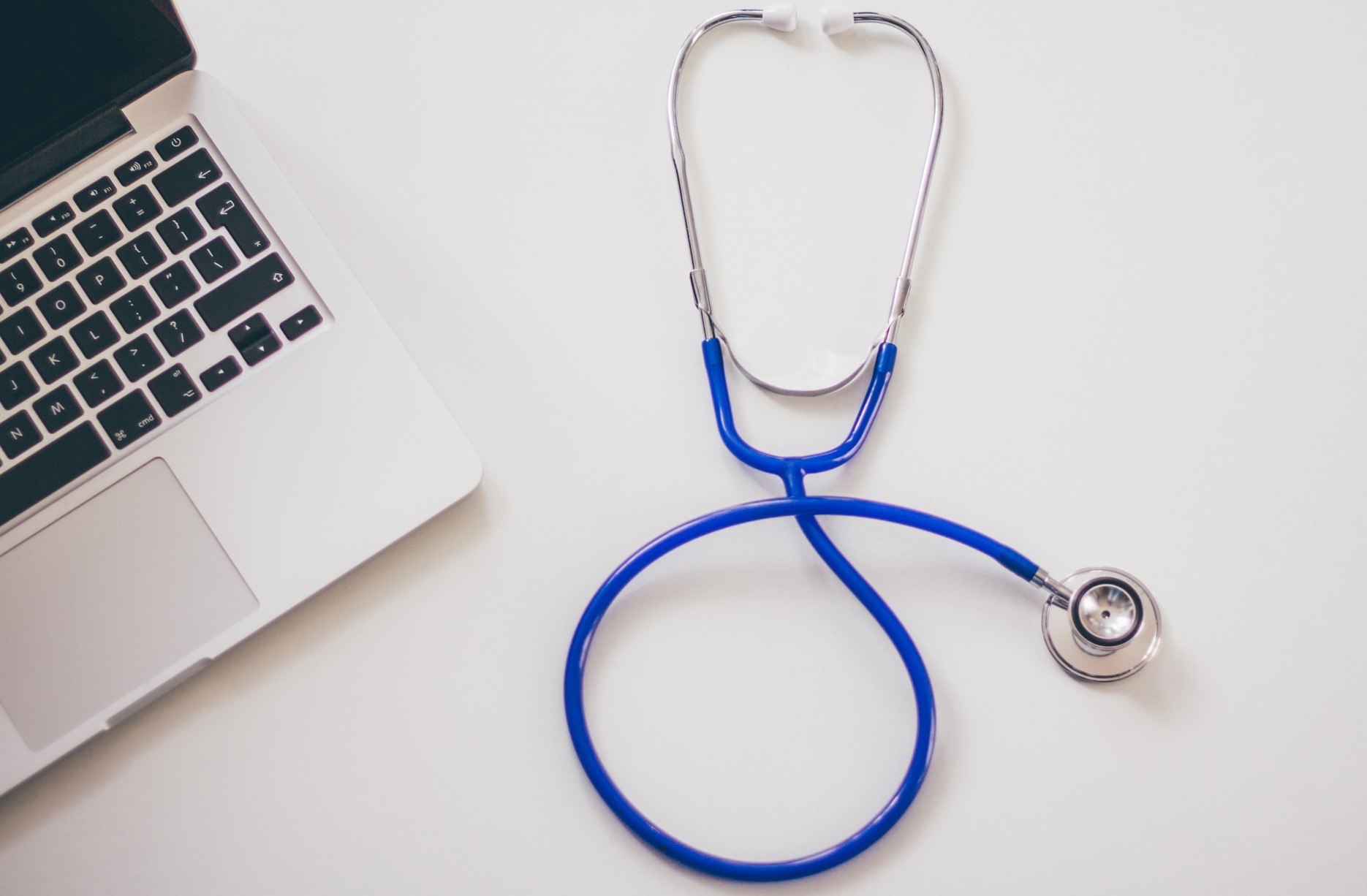 A Stethescope next to a laptop; our No Win No Fee solicitors specialise in medical negligence compensation claims.  Click this picture to visit the page.