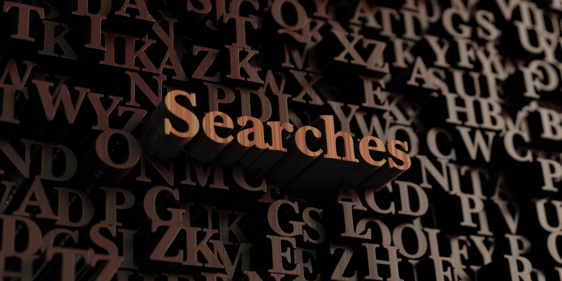 'Searches' in brown, block letters, surrounding by a random assortment of other letters.