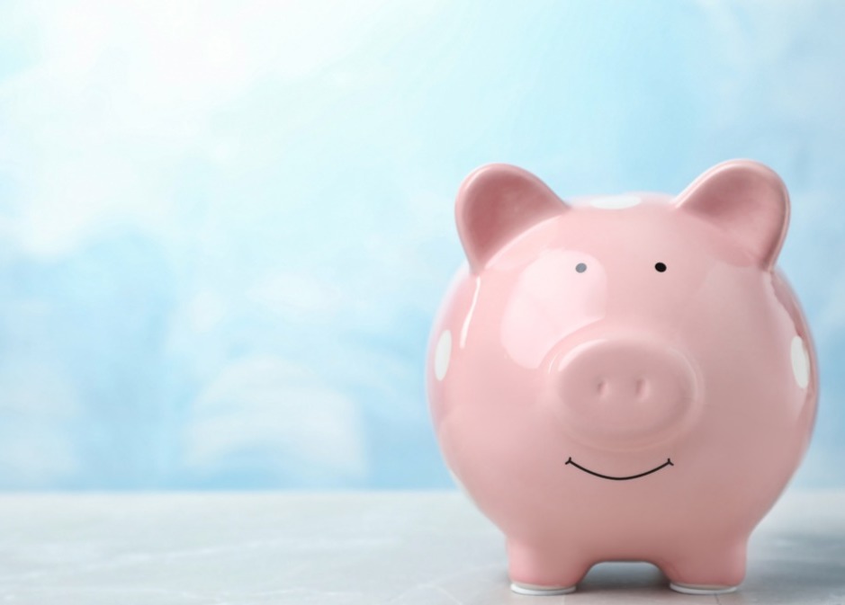 MG Legal offer affordable fixed fees - a pink piggy bank against a blue background; at MG Legal our local solicitors offer fixed-fees and No Win No Fee compensation claims..