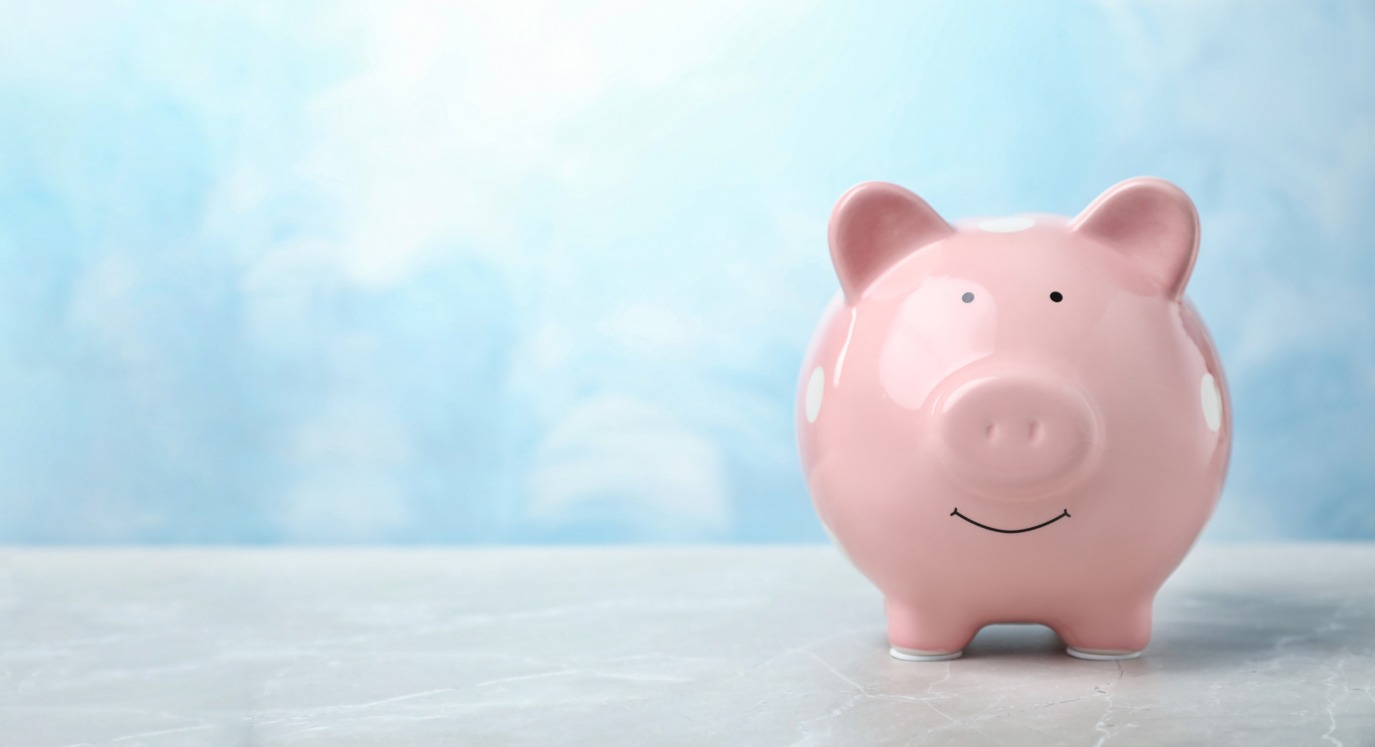 A piggy bank, on a blue background; our Conveyancing Solicitors in Lancaster discuss methods of financing a property, and how we can help your property purchase.