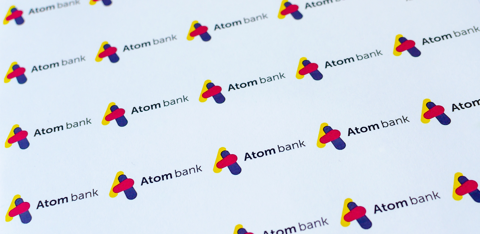 Atom Bank's logo; our Conveyancing Solicitors are Solicitors on Atom Bank's Panel