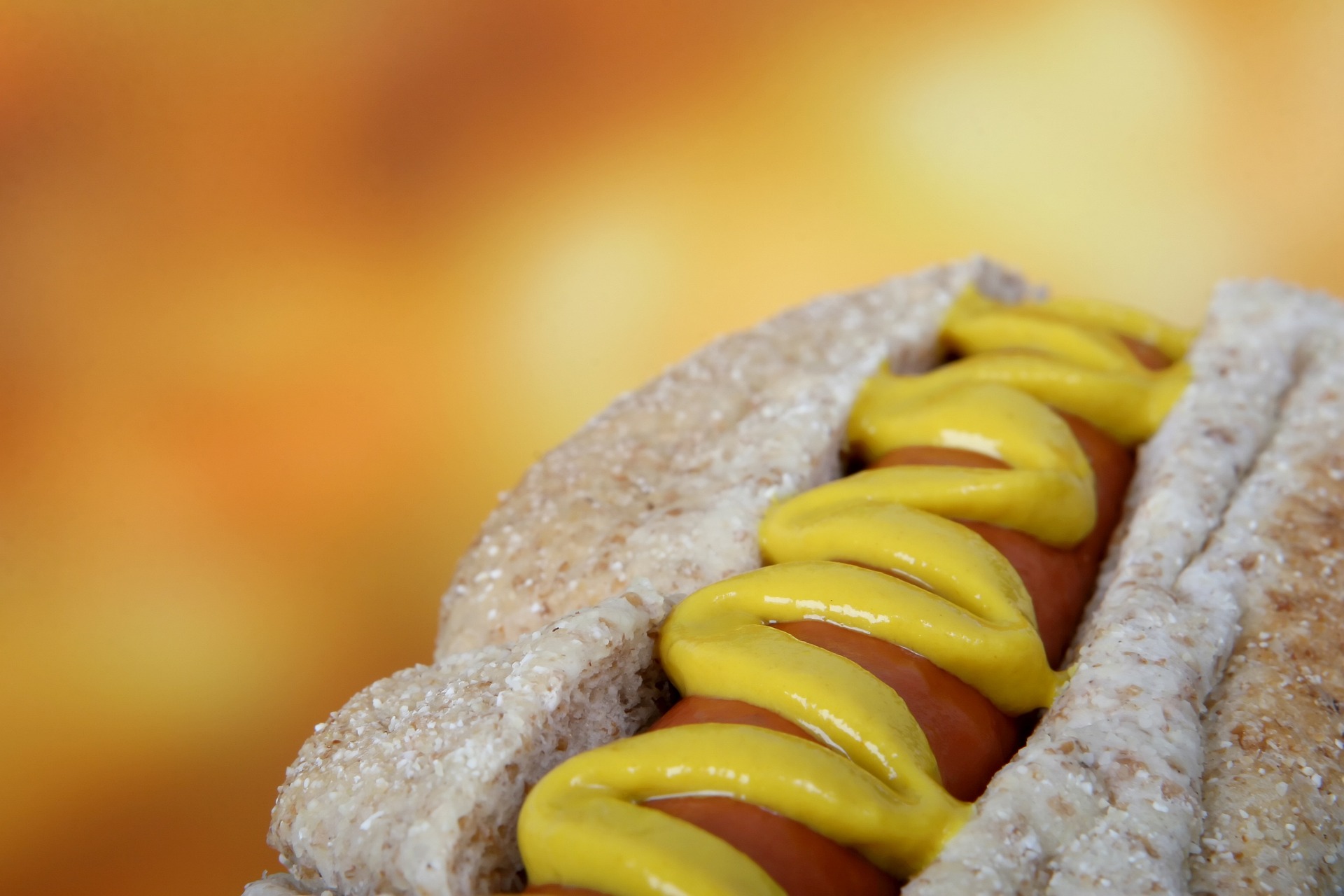 A hotdog, with mustard on; our mustard allergy compensation solicitors can assist you with making a compensation claim.  Click this picture to read more about mustard allergy compensation claims.