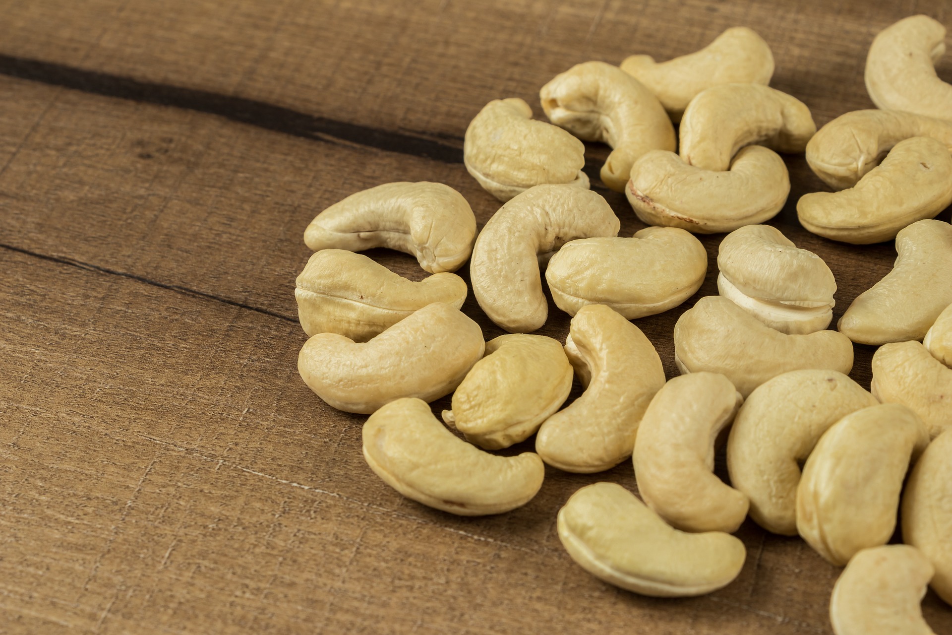A pile of cashew nuts; our No Win No Fee Solicitors discuss nut allergies and how we can help make a claim.