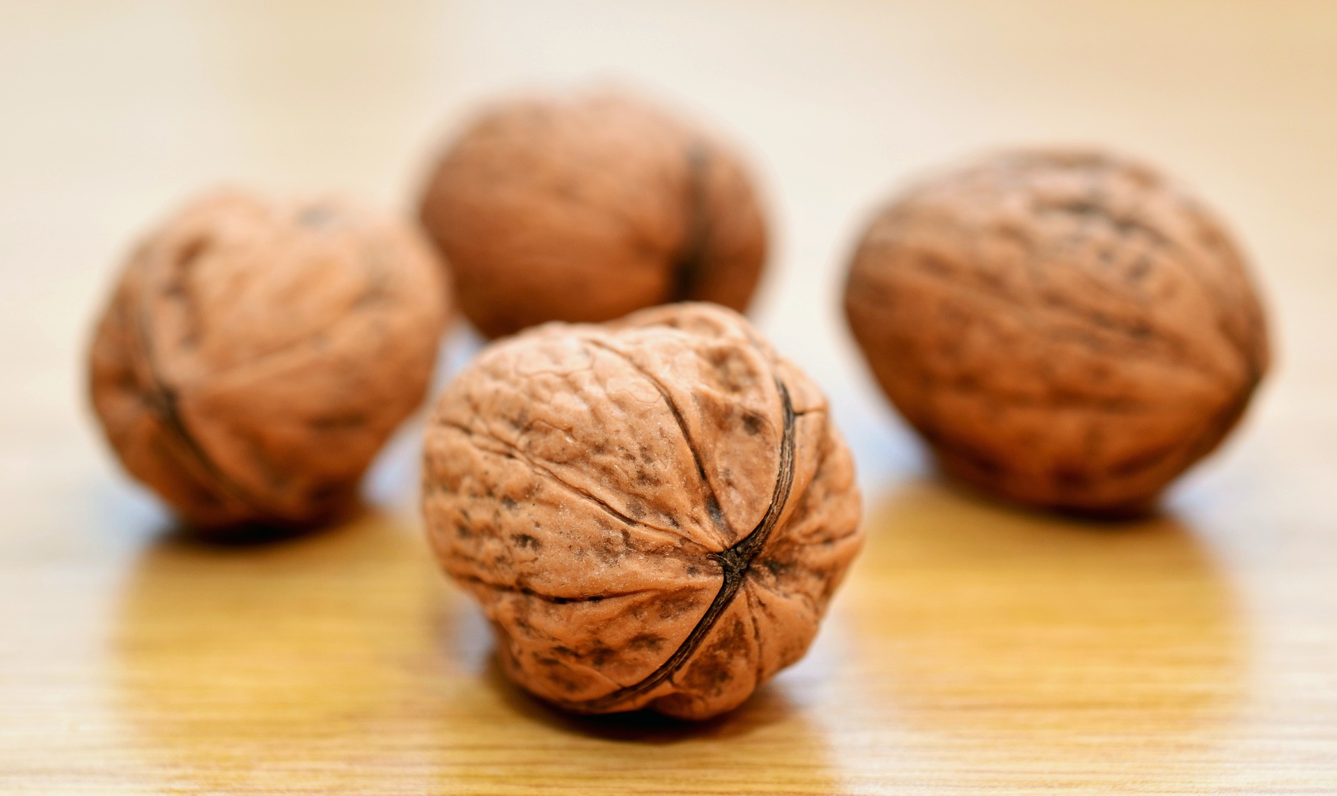 A pile of walnuts nuts; our No Win No Fee allergy compensation solicitors discuss reporting food allergies, and no win no fee food allergy compensation claims.