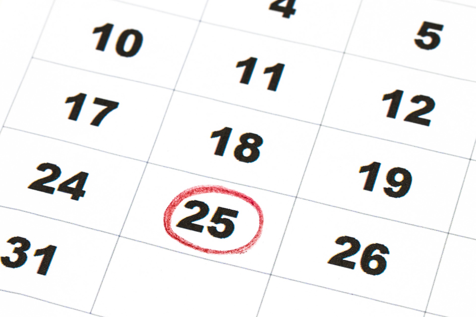 Calendar showing the 25th Day of the month encircled as the property completion date
