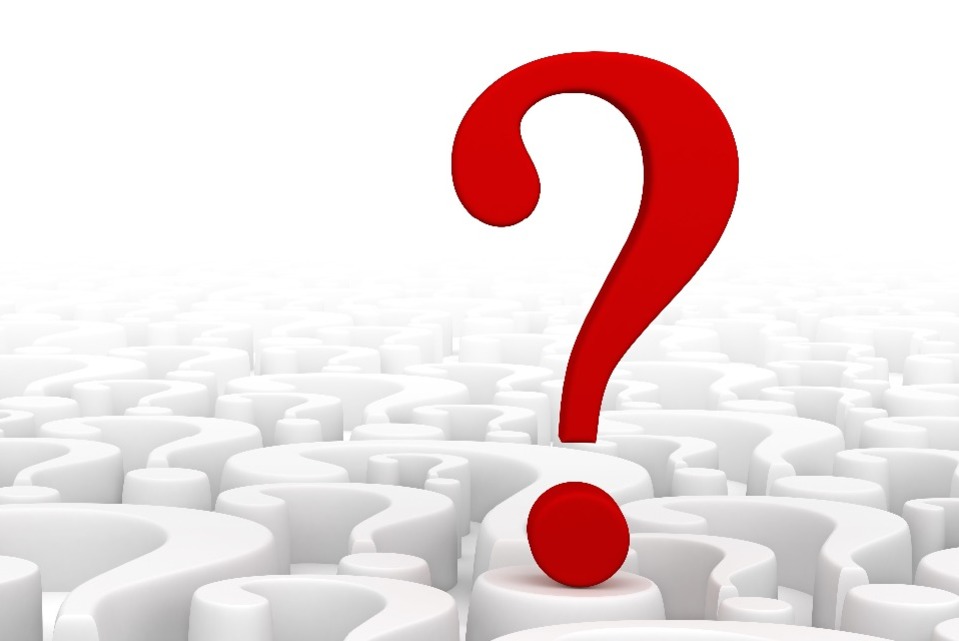 A big red question mark against a white background of question marks.