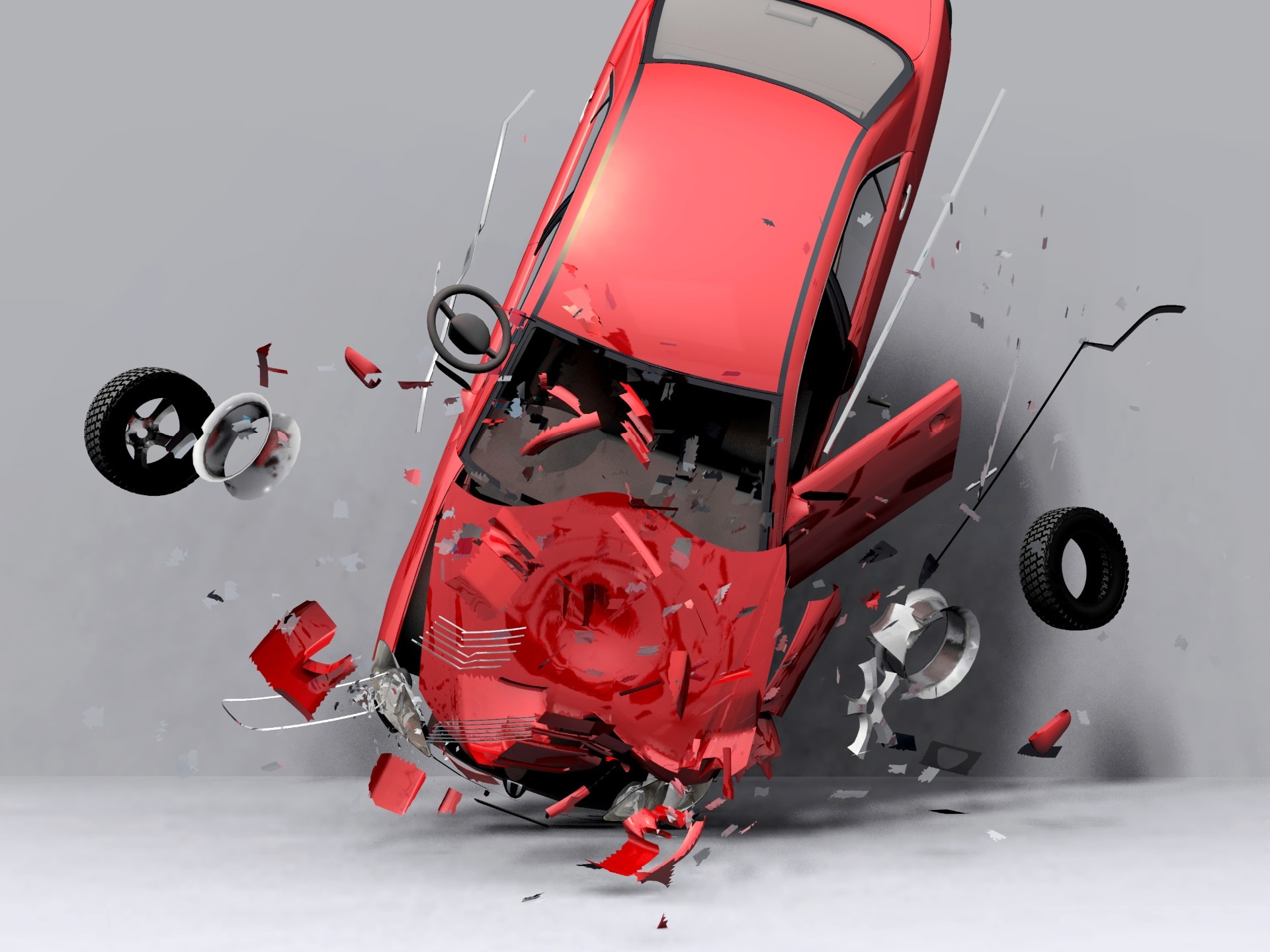 A red car which has been in an accident, smashed from the front, the tires have flown off.