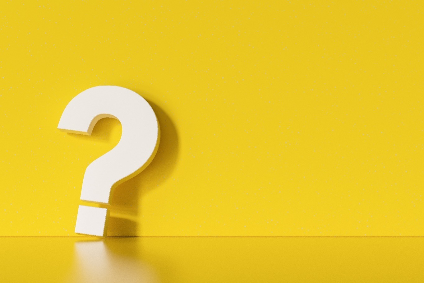 A big white question mark against a yellow background.