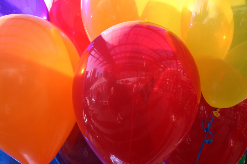 Yellow, orange and red balloons.
