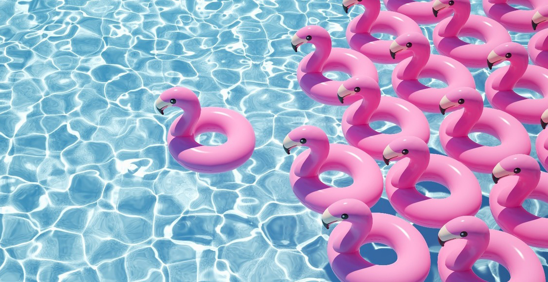 Flamingo floats on a blue pool; our No Win No Fee solicitors can assist with an injury compensation claim from your injuries caused on a cruise ship.